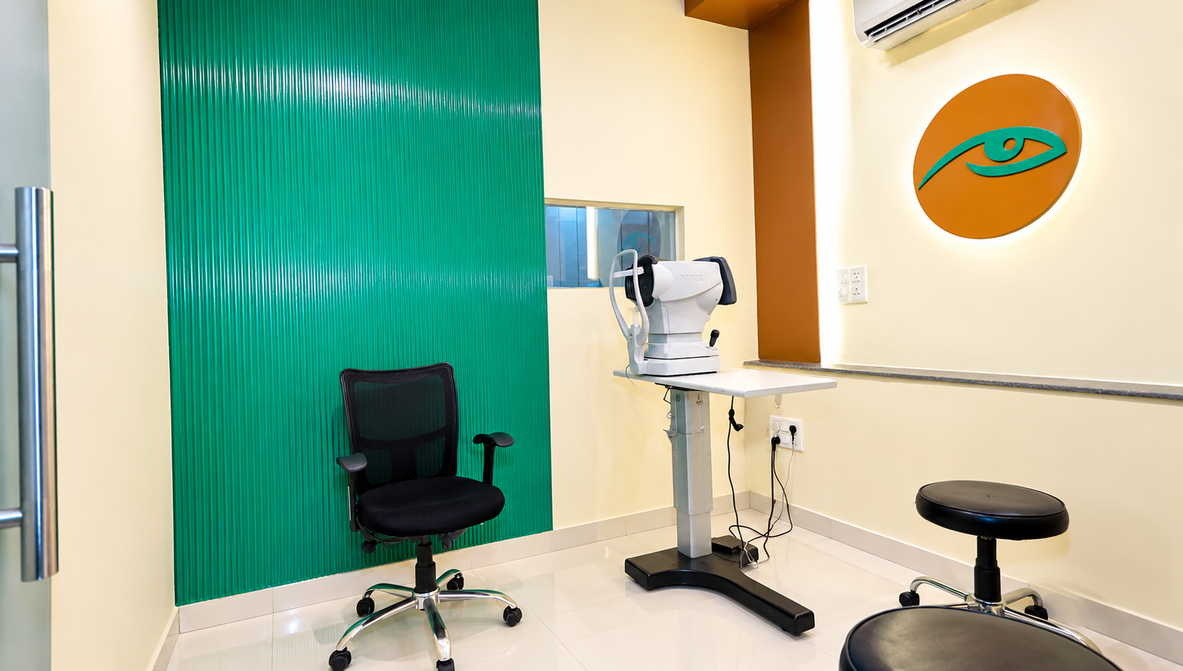 Eye examination room with clinical equipment