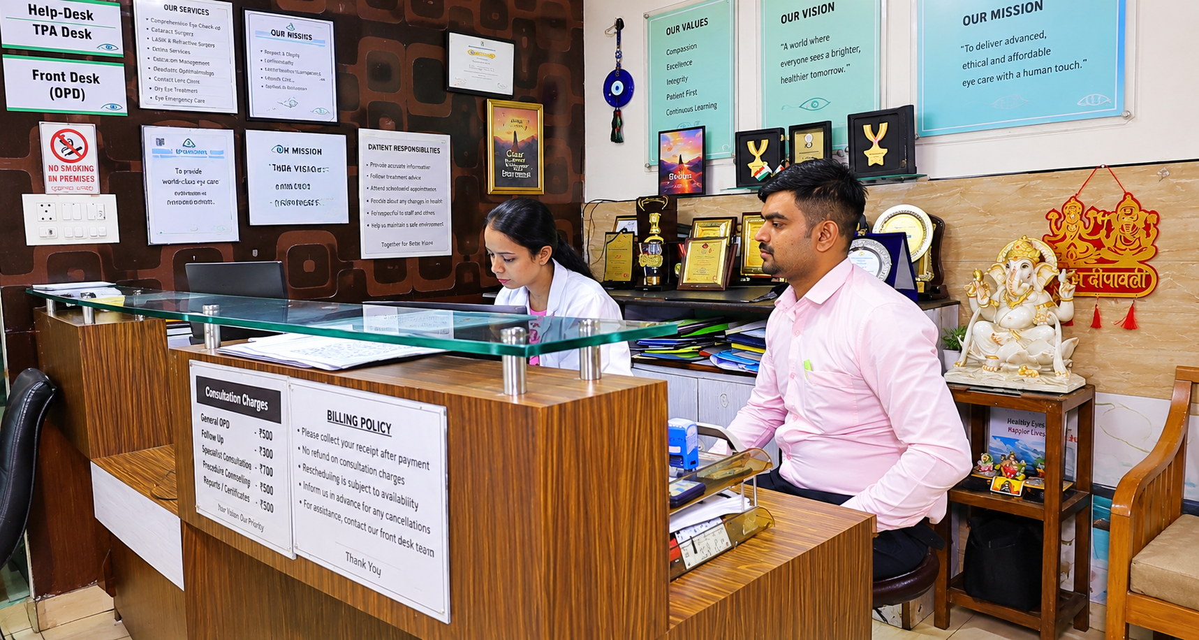 Hospital reception counter with staff attending patients