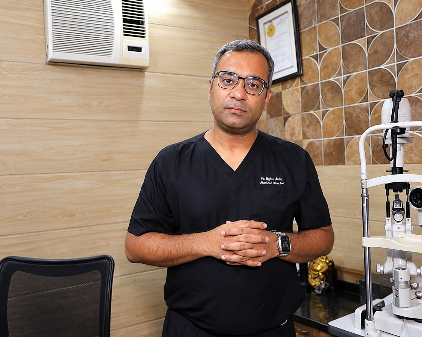Doctor seated in a consultation room to discuss eye-care options